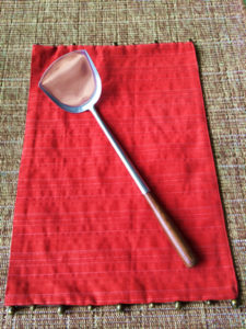 This beautiful spatula was sourced from Thailand and has a teak wood handle! Everything about it is perfect for stir frying.