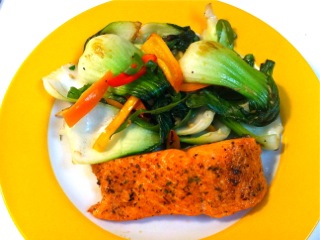 Grilled salmon with Moroccan Spice Rub and stir fried bok choy and mini sweet peppers. 