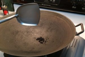 How to clean crust and restore cast iron wok