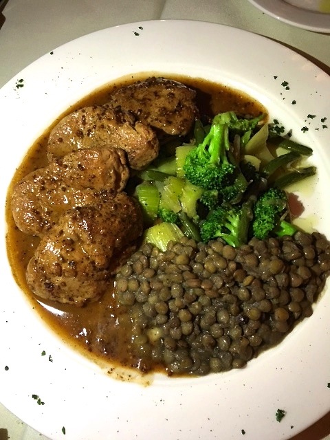 Pork filet medallions sauteed with whole grain mustard sauce, lentils and sauteed broccoli. 