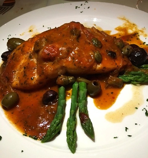 Salmone alla Livornese - salmon sauteed with cherry tomatoes, olives & capers with asparagus. 