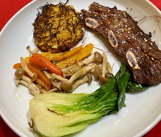 Kalbi, beech mushrooms, baby bok choy and grilled zoodles.